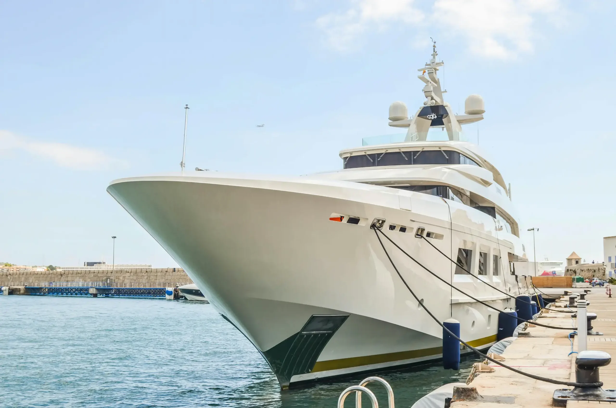 Luxury yacht in a Mallorca; click to view comprehensive marine insurance coverage options, including third-party liability and hull protection.